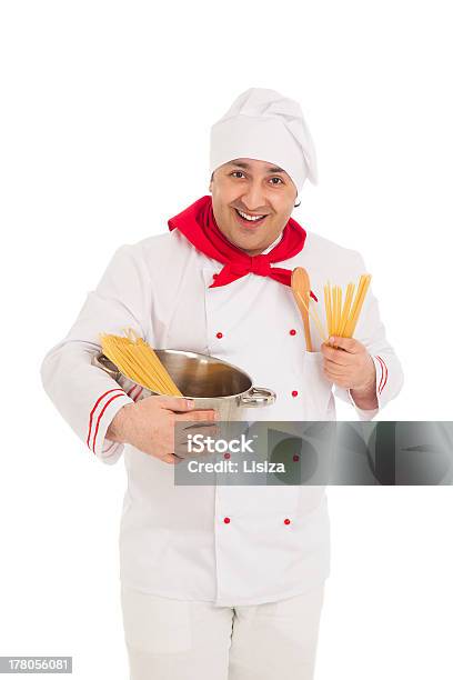 Smiling Cook Man Holding Pan Filled With Raw Macaroni Stock Photo - Download Image Now