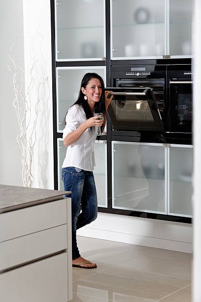 istock Woman in her stylish kitchen 178058266