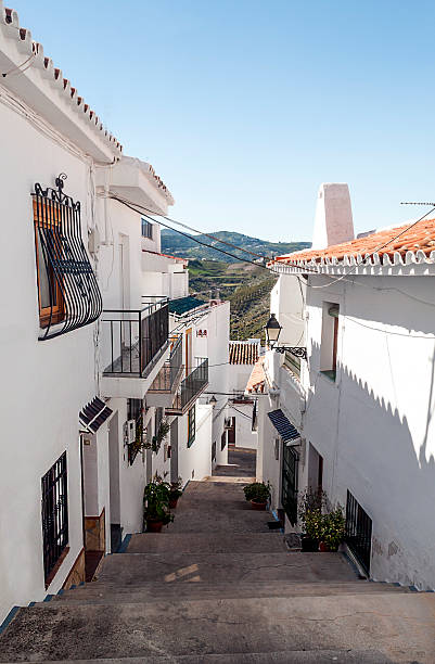 istock Street with pots and mountains 178058549