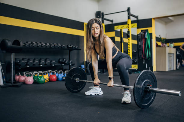 istock Fit woman weightlifting 1780596135