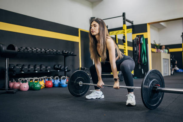 istock Fit woman weightlifting 1780596672