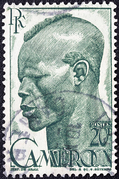 istock Cameroonian stamp shows native head (1946) 178059891