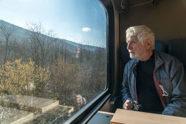 istock Senior men traveling by train 1780601012