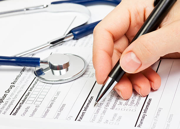 istock Hand with pen over Rx patient info 178060569