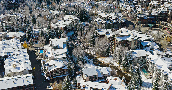 Winter View of Vail Mountain - Scenic views in winter of Vail Village in Vail, Colorado USA. Ski runs and slopes of front side of mountain with town below.