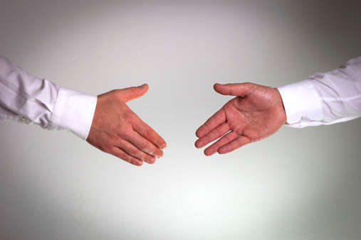 Hand shake between a businessmanHand shake between a businessman