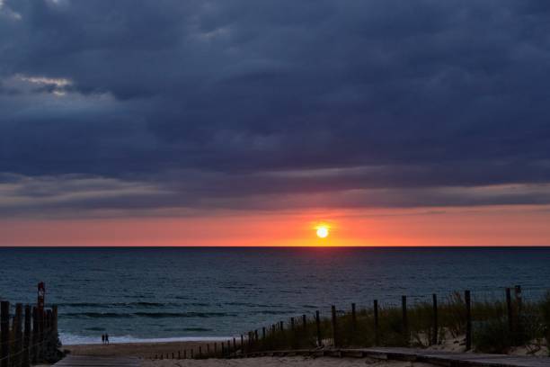 istock Sunset under stormy clouds on the Atlantic beach near the Dune du Pilat 1780623401