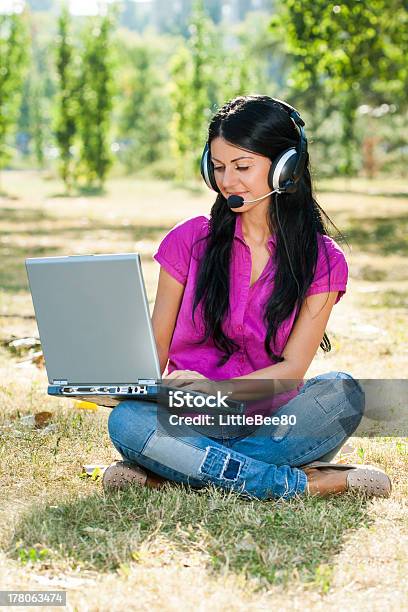 Woman With Headset Using Laptop Stock Photo - Download Image Now - Accessibility, Adult, Adults Only