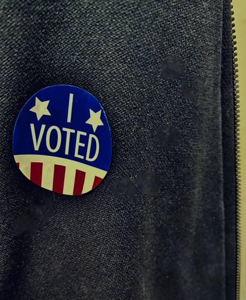 istock “I Voted” Sticker on Faded Blue Jacket 1780635433