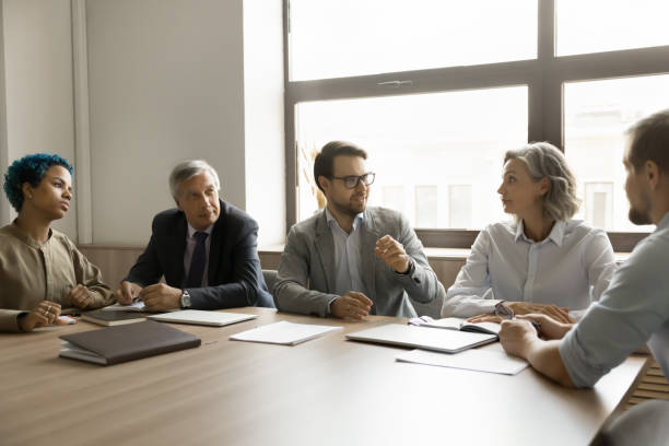 istock Diverse modern business team working on project together 1780635990