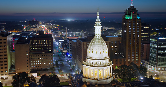 Aerial shot of the Michigan State Capitol Building in Lansing in pre-dawn twilight on a Fall morning. 

Authorization was obtained from the FAA for this operation in restricted airspace.