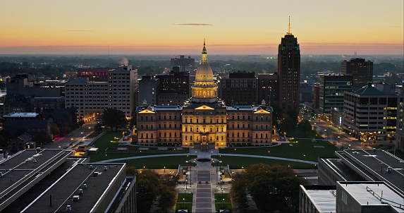 Aerial shot of the Michigan State Capitol Building in Lansing before sunrise on a Fall morning. 

Authorization was obtained from the FAA for this operation in restricted airspace.