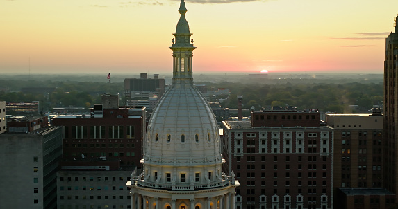 Aerial shot of the Michigan State Capitol Building in Lansing at sunrise on a Fall morning. 

Authorization was obtained from the FAA for this operation in restricted airspace.