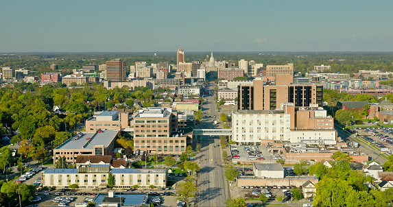 Aerial shot of Lansing on a sunny Fall morning, looking along Michigan Avenue towards the State Capitol Building. 

Authorization was obtained from the FAA for this operation in restricted airspace.