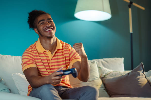 istock Online playing video games and winning 1780646696
