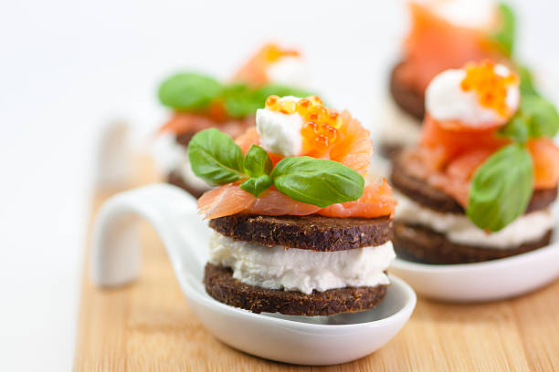 Salmon pumpernickel canape stock photo