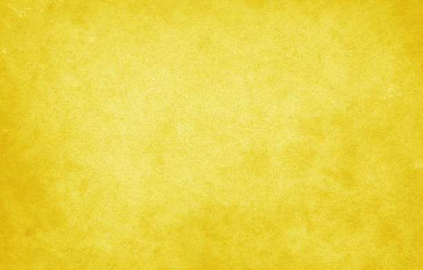 Yellow textured paper background stock photo