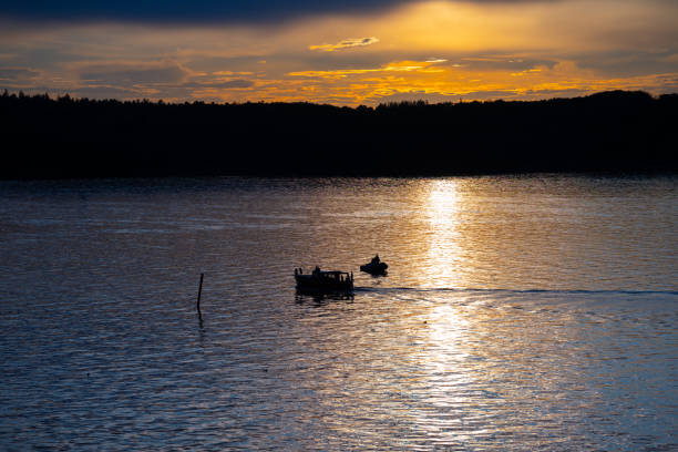 istock Boats at siea at sunset.. 1780658978