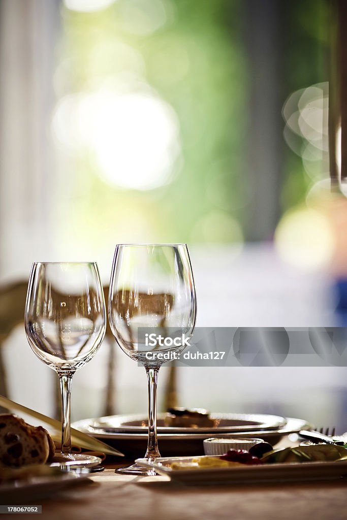 Empty glasses set in restaurant Empty glasses set in restaurant. Part of interior Table Stock Photo