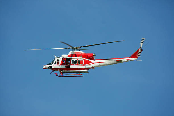 istock patrol helicopter of firefighters in blue sky over a fire 178068630