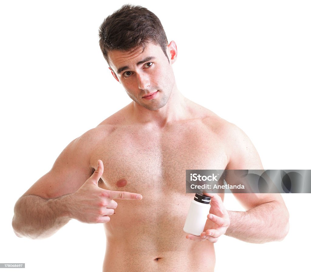 Homem apontando para um Frasco de Comprimidos - Foto de stock de Abdome royalty-free