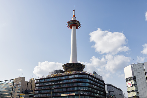 Kyoto, Japan - April 17, 2023: view of the Kyoto Tower. It is an observation steel tower and with 131 metres the tallest structure in Kyoto