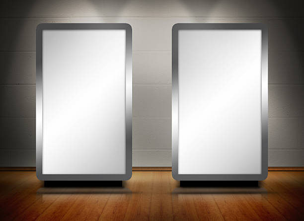 istock Two blank screens standing on wooden floor 178069449
