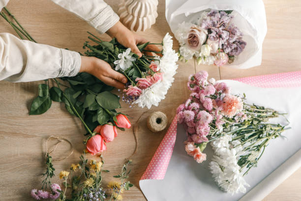 istock Florist at work. Woman making autumn floral decorations 1780695197