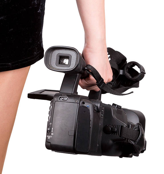 istock woman holding  video camera 178070226