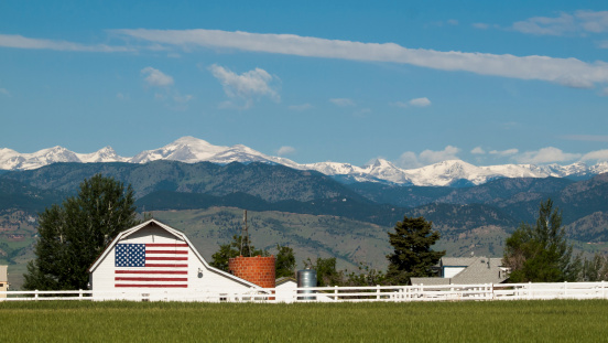 White barn with painted American Flag in Colorado.