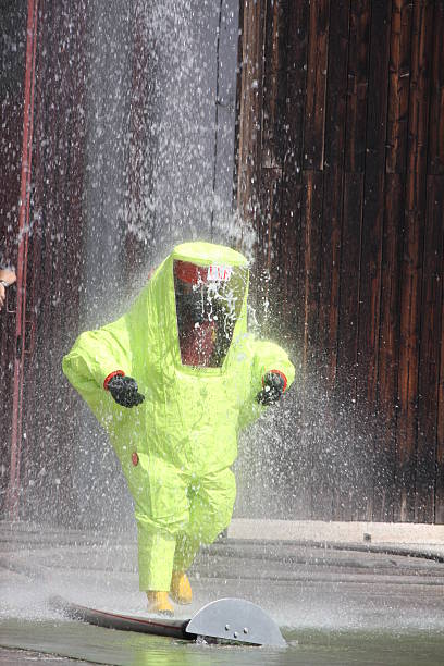istock Fireman with a suit for protection in the midst 178070904