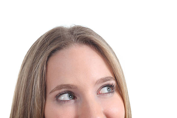 istock Blue eyes of a woman looking above 178072264