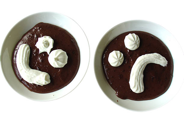 funny chocolate pudding faces stock photo