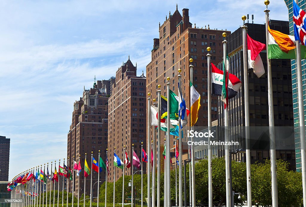 United Nations Headquarters with flags United Nations Headquarters with flags of the   members of the UN United Nations Building Stock Photo