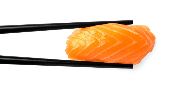 istock Chopsticks with delicious nigiri sushi isolated on white, top view 1780735064