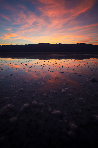 Sunset over the lake Hurricane Hilary created at Badwater Basin in Death Valley National Park