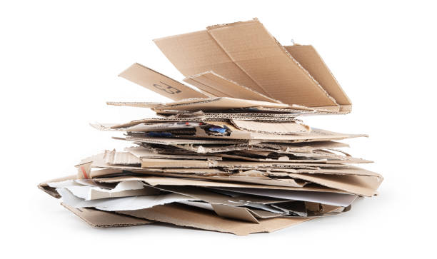 istock Pile of cardboard packaging. Cardboard recovered from old shipping boxes, paper material ready for recycling, isolated on white background, close-up. 1780752662