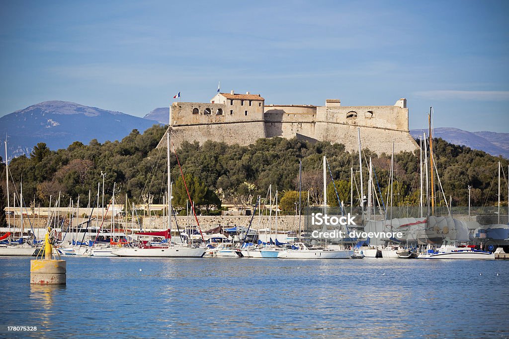 Antibes harbor, France, with yachts and Fort Carre Antibes harbor, France, with yachts and Fort Carre. Horizontal shot Activity Stock Photo