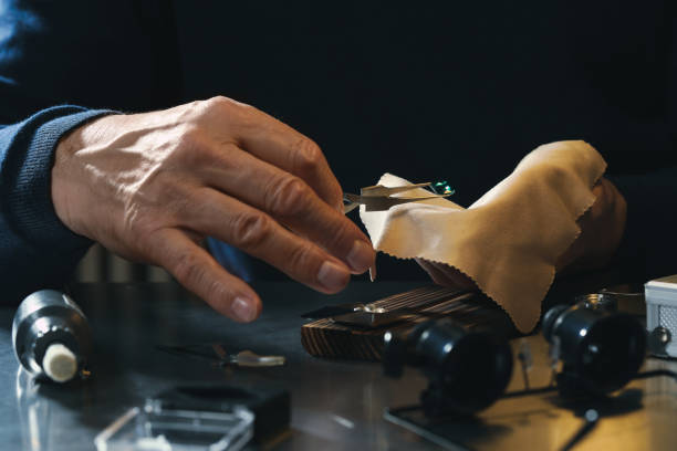 istock Professional jeweler working with gemstone at table, closeup 1780754308