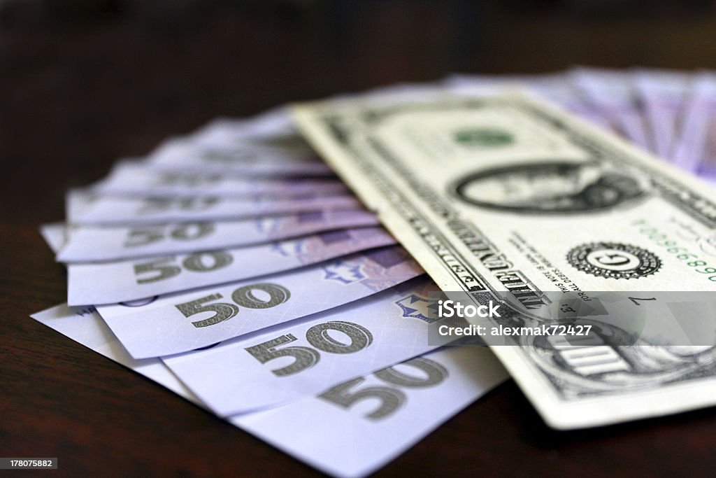 Notas de dólar e grivnas isolado - Royalty-free Atividade Comercial Foto de stock