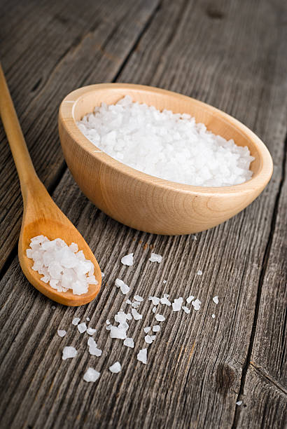 istock sea salt in a wooden spoon 178076258