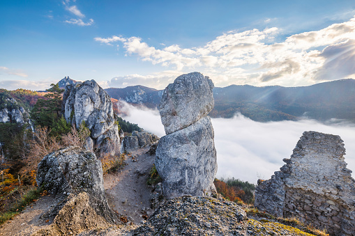 The Sulov castle ruin at autumn morning. The Sulov Rocks, national nature reserve in northwest of Slovakia, Europe.
