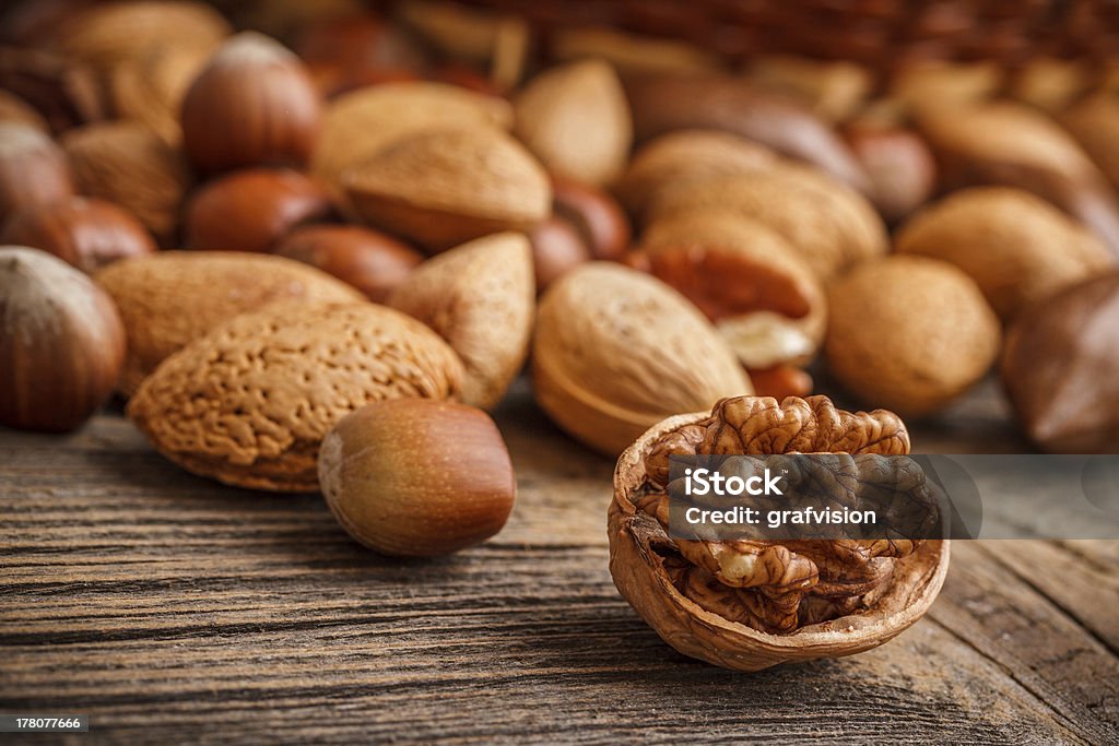 Assorted of nuts Assorted of whole and chopped nuts Almond Stock Photo
