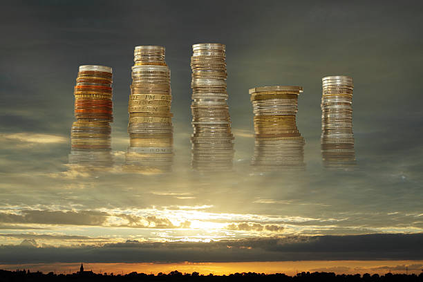 istock Stakes of Coins Against Sunset 178078094