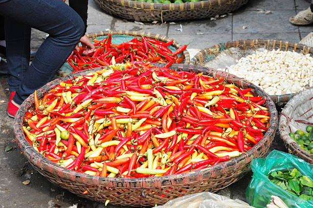 Colored in Red and Yellow Vietnamese Peppers at a Local Market