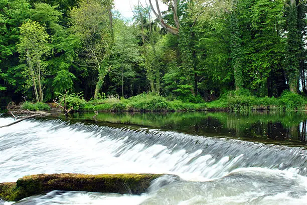 flowing weir on the river liffey at the k club in county kildare ireland