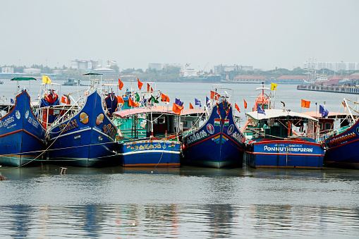 kerala, India- March 25, 2023 fishing boats halted in fort kochi boat yard during trawling ban in kerala