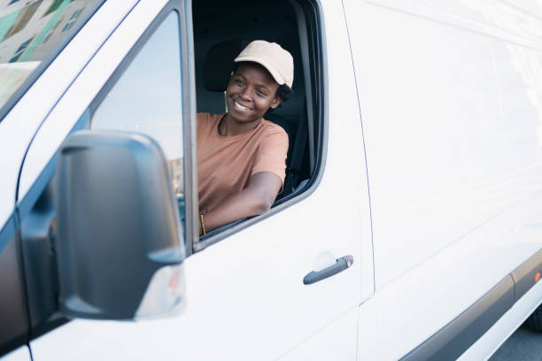 istock African young woman working as a delivery van driver 1780791186