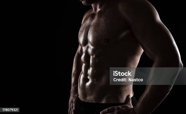Athlete Close Up Stock Photo - Download Image Now - Abdominal Muscle, Black Background, Men