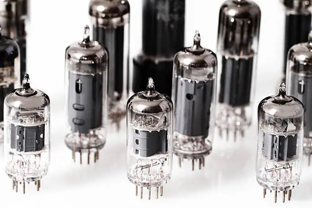 Glass vacuum radio tubes.  Isolated image on white background